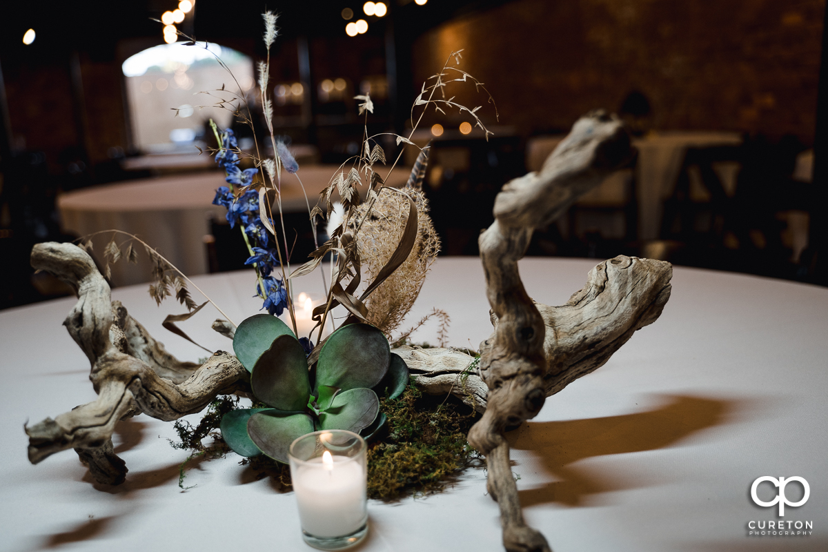 Centerpieces at the wedding reception .