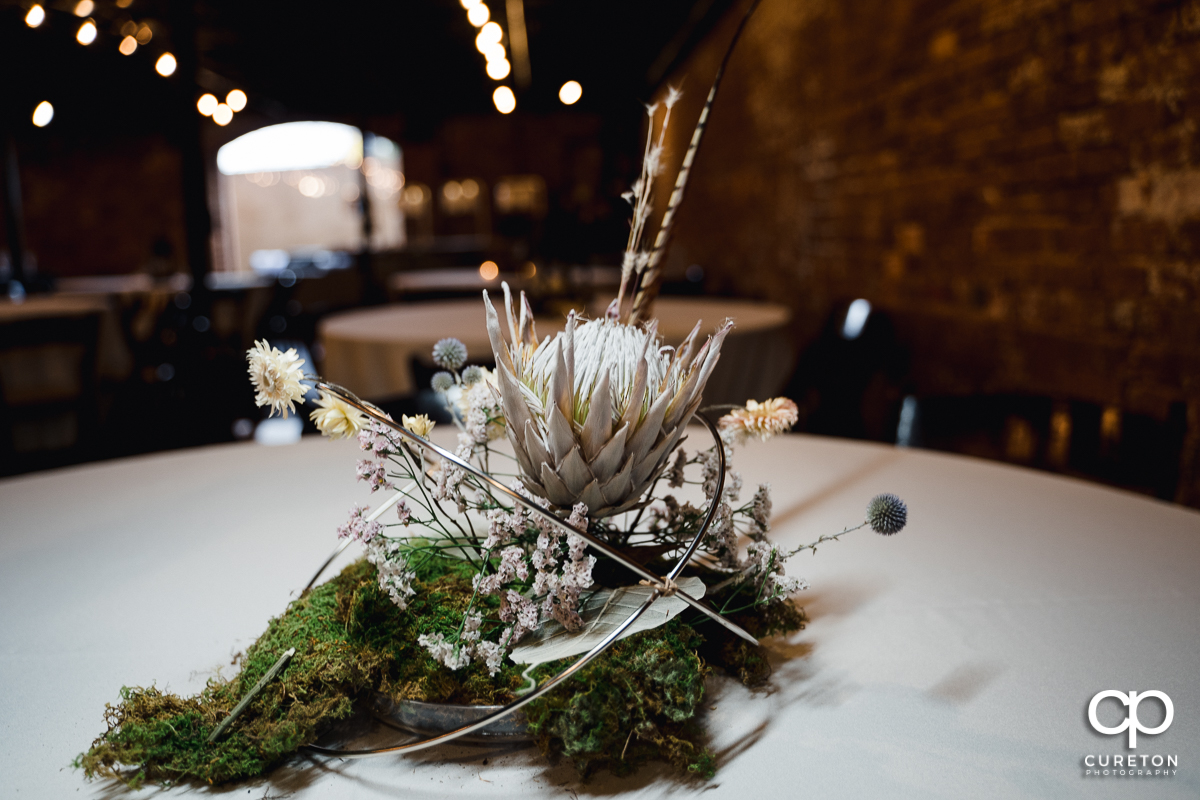 Centerpieces at the wedding reception .