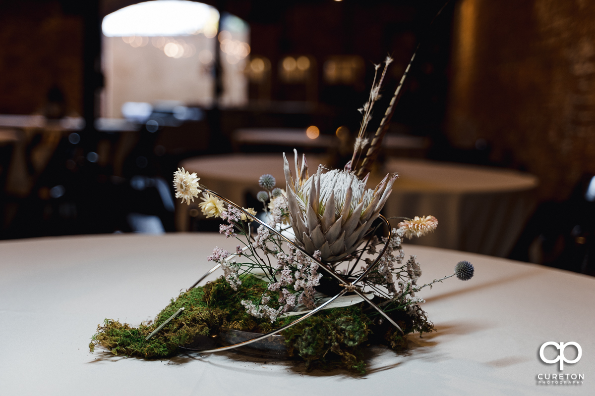 Centerpieces at the wedding reception .