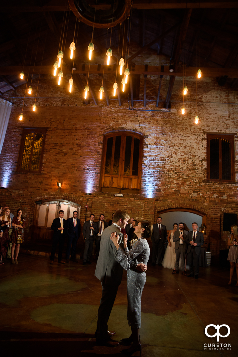 Groom dancing with his mom.