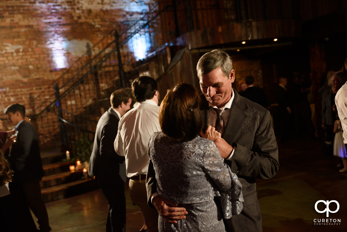 Guests dancing to the sounds of Jumping Jukebox at the Old Cigar Warehouse reception.