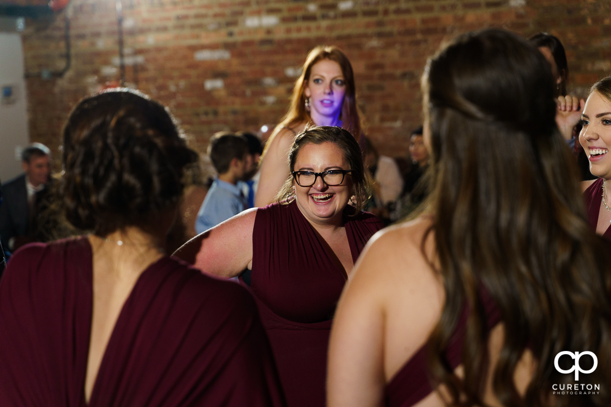 Guests dancing to the sounds of Jumping Jukebox at the reception.