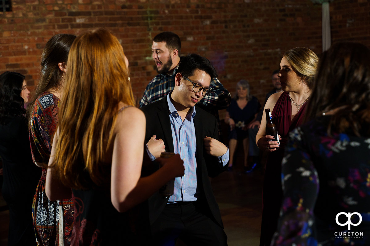 Guests dancing to the sounds of Jumping Jukebox at the reception.