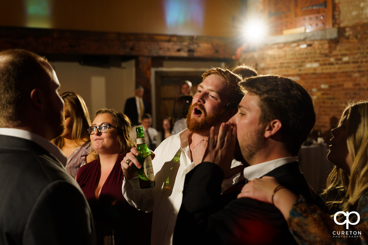 Guests dancing to the sounds of Jumping Jukebox at the reception.