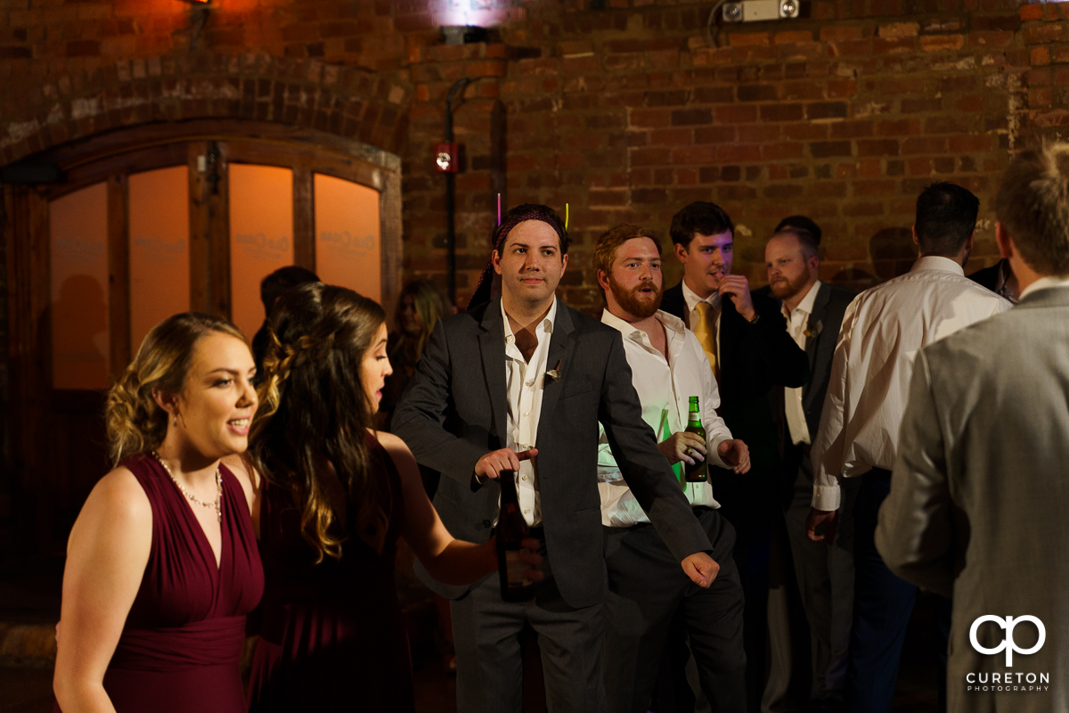 Guests dancing to the sounds of Jumping Jukebox at the reception.