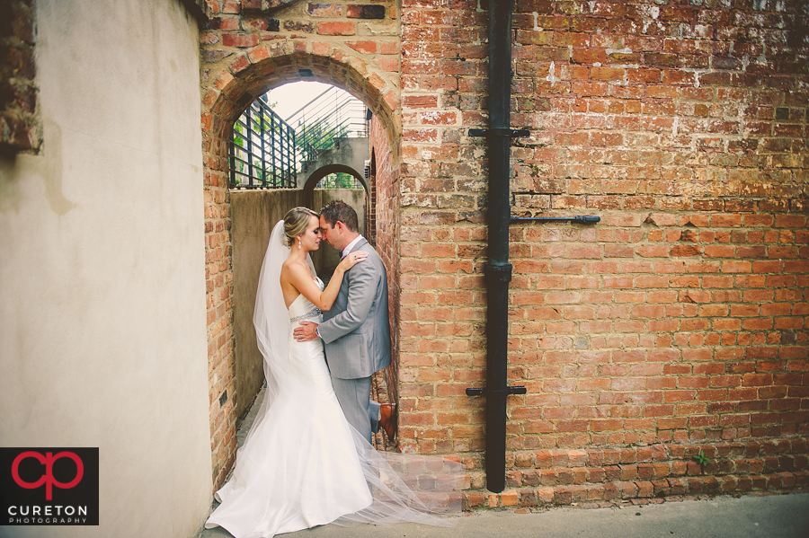 Bride and Groom outside the Old Cigar Warehouse in Greenville,SC.