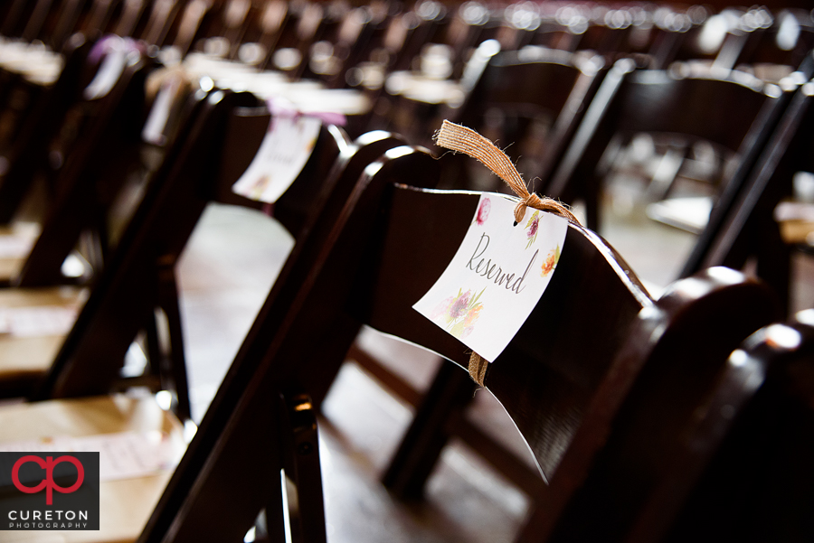 Reserved sign on chairs.