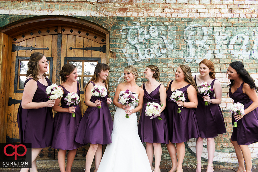 Bridesmaids looking at the bride.