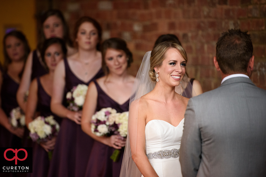 Bride looking at the groom during the ceremony.