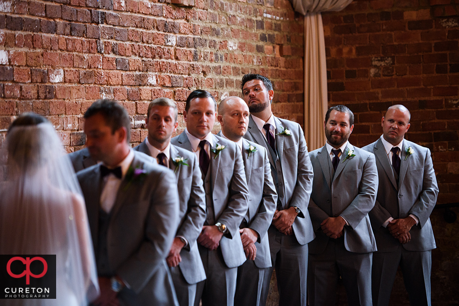 Groomsmen during the ceremony.