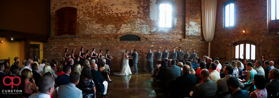 Panorama of the wedding ceremony at Old Cigar Warehouse.