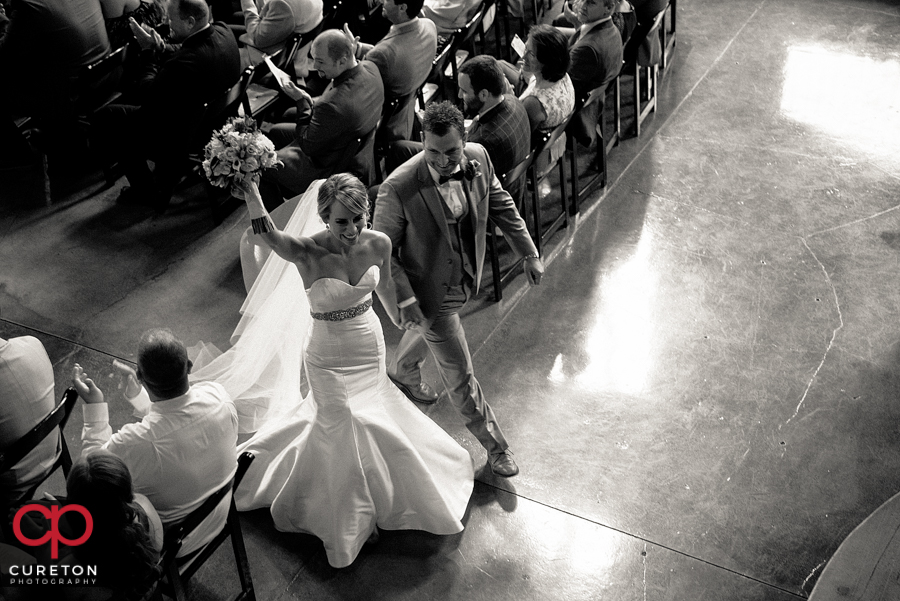 Bride and groom leaving the ceremony.