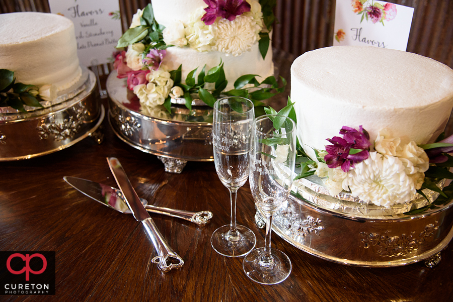 Wedding cake and glasses.