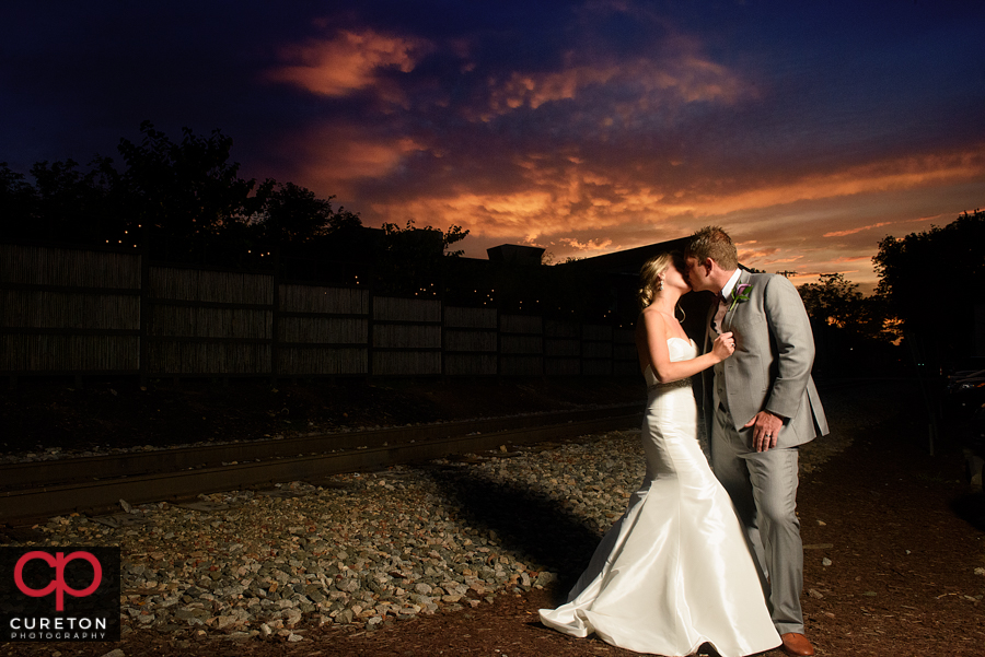 The bride and groom at sunset in downtown Greenville,SC.