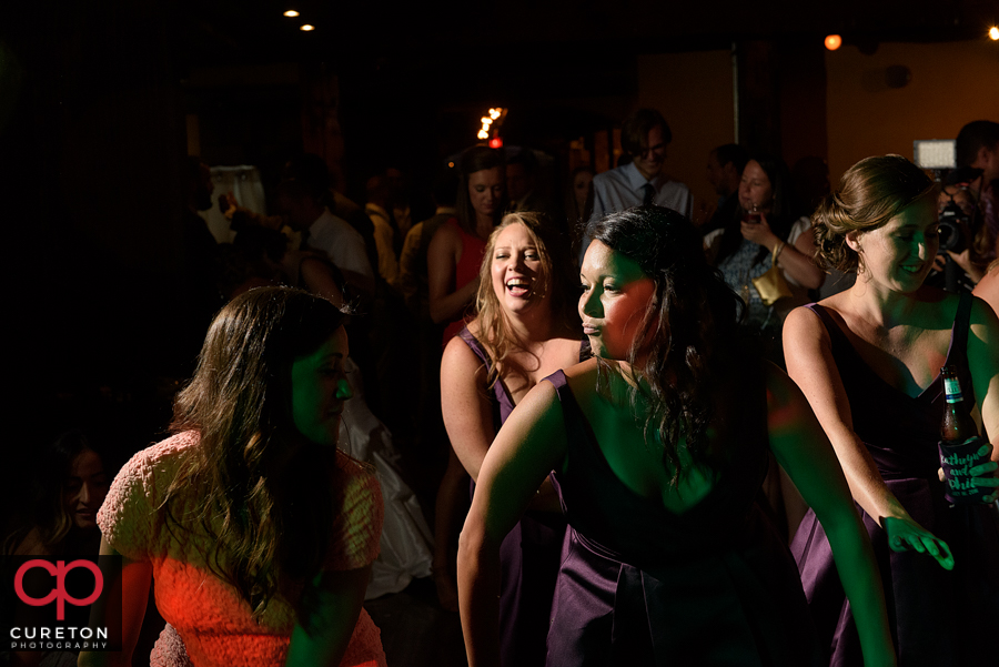 Wedding guests dancing to the sounds of Uptown Entertainment.