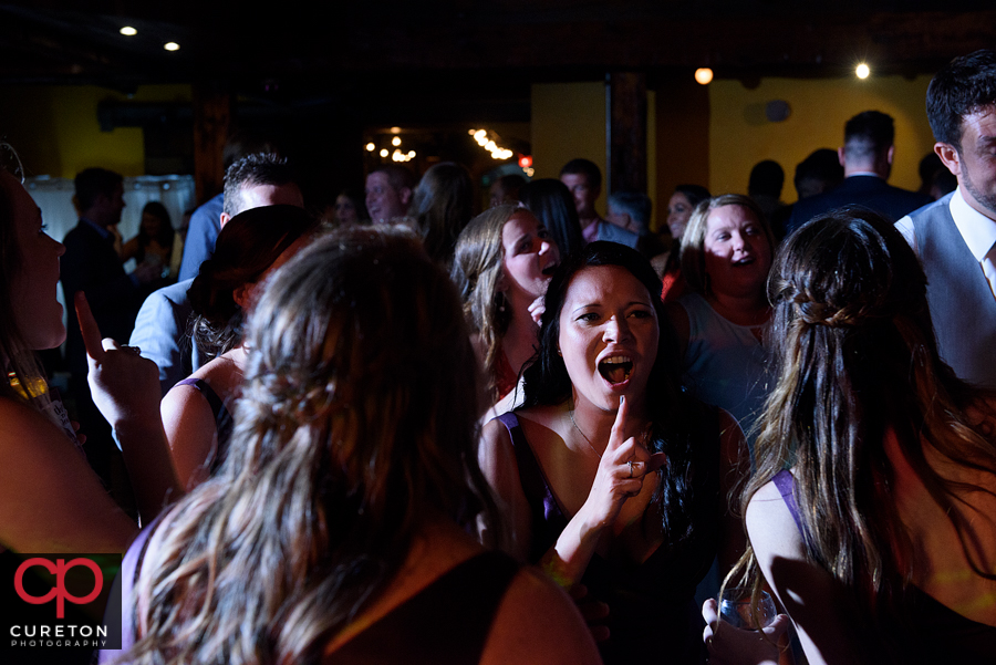 Wedding guests dancing to the sounds of Uptown Entertainment.