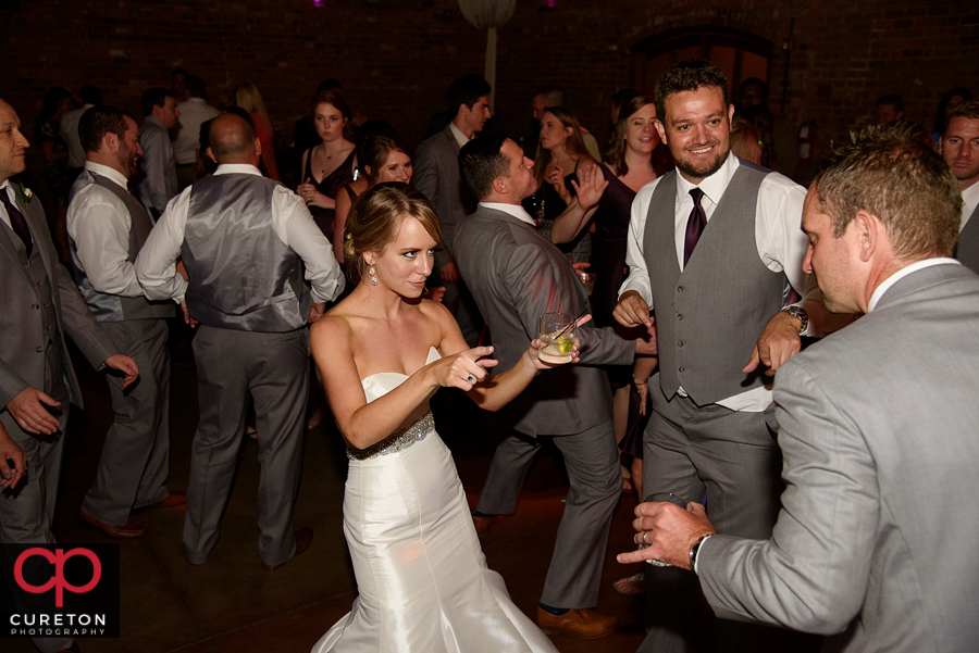 Wedding guests dancing to the sounds of Uptown Entertainment.