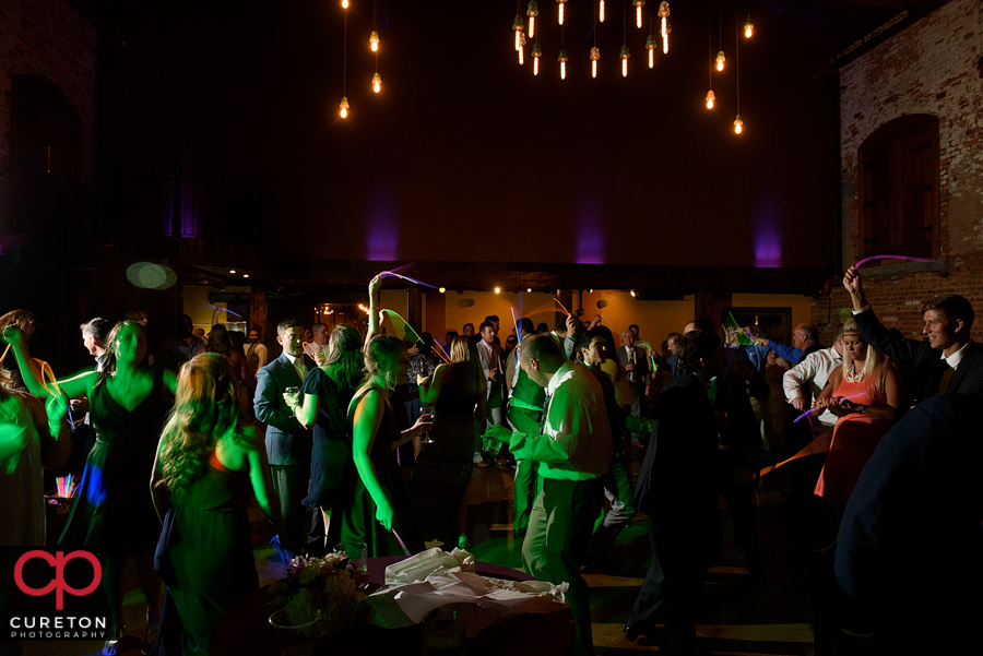 Wedding guests dancing to the sounds of Uptown Entertainment.