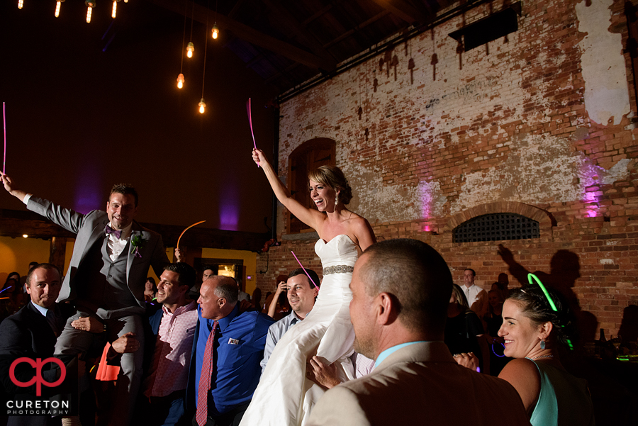 Wedding guests dancing to the sounds of Uptown Entertainment.