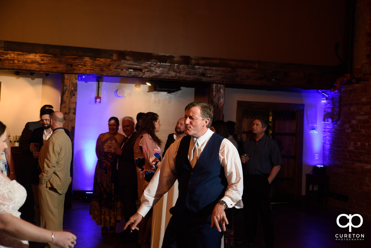 Bride dancing with her father at the wedding reception.