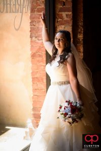 Bride in window light.