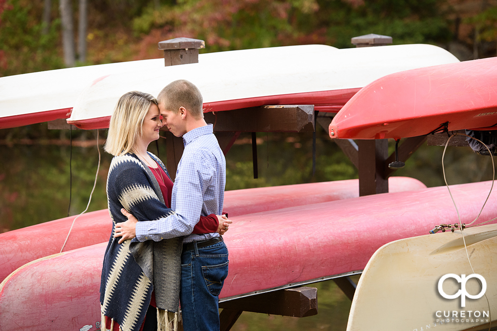 Engaged couple near the lake during the Paris mountain engagement session.