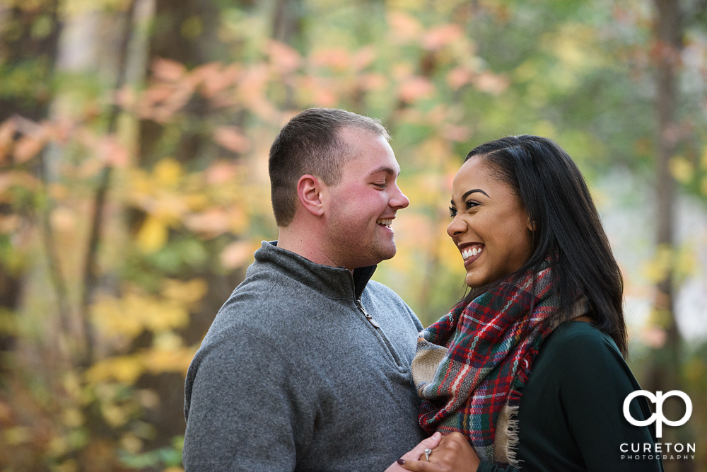 Future bride and groom during their Paris Mountain State Park Engagement Session in Greenville,SC.
