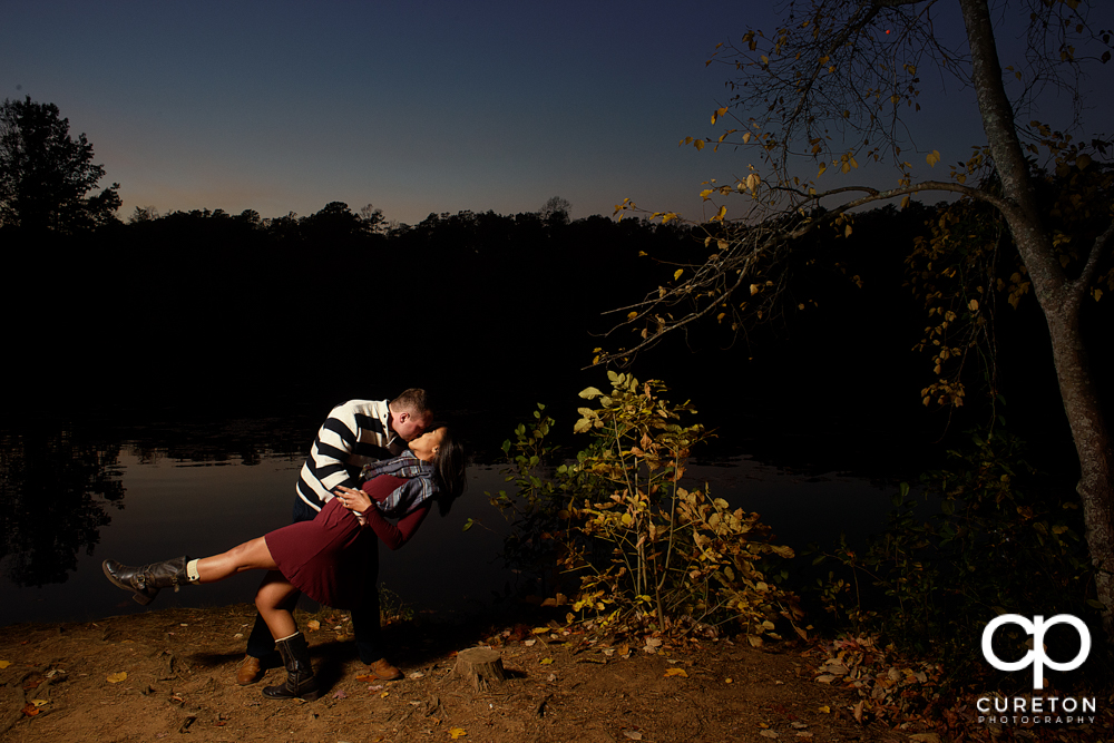 Engaged couple dancing during their Paris Mountain State Park Engagement Session in Greenville,SC.