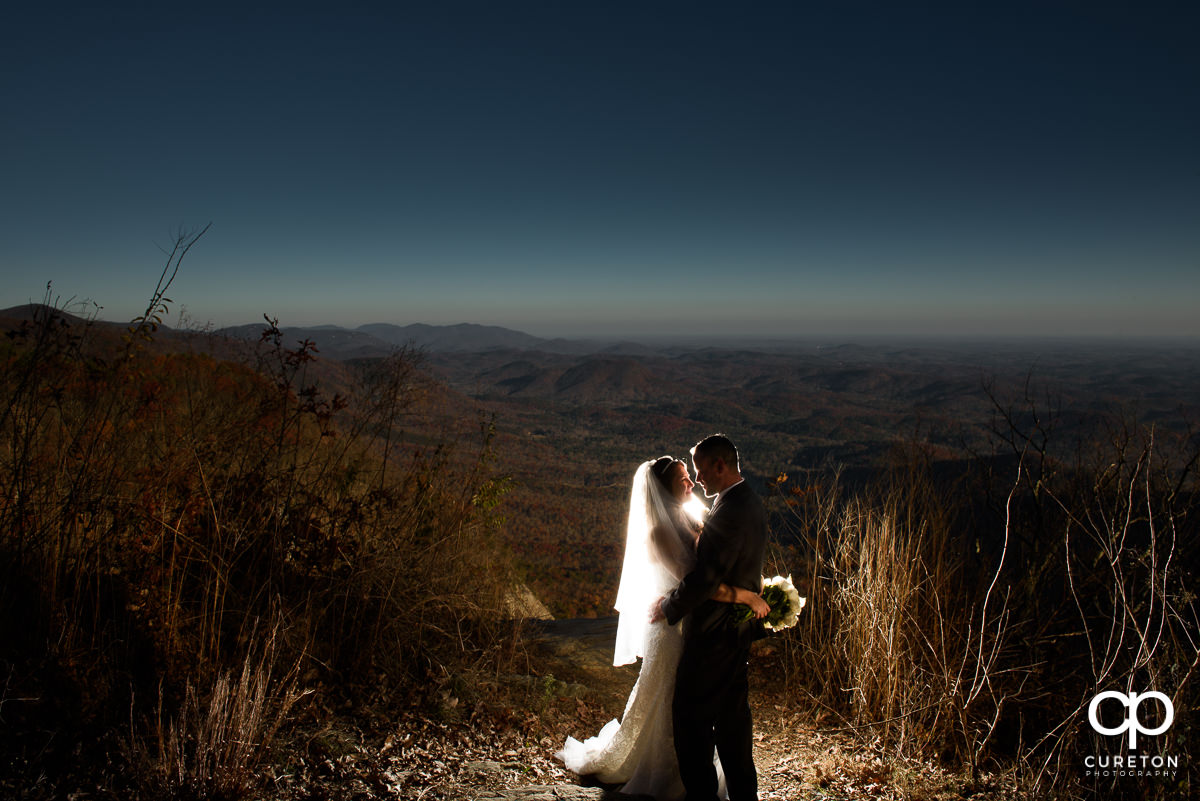 Bride and Groom overlooking the mountains after their wedding at Pretty Place.