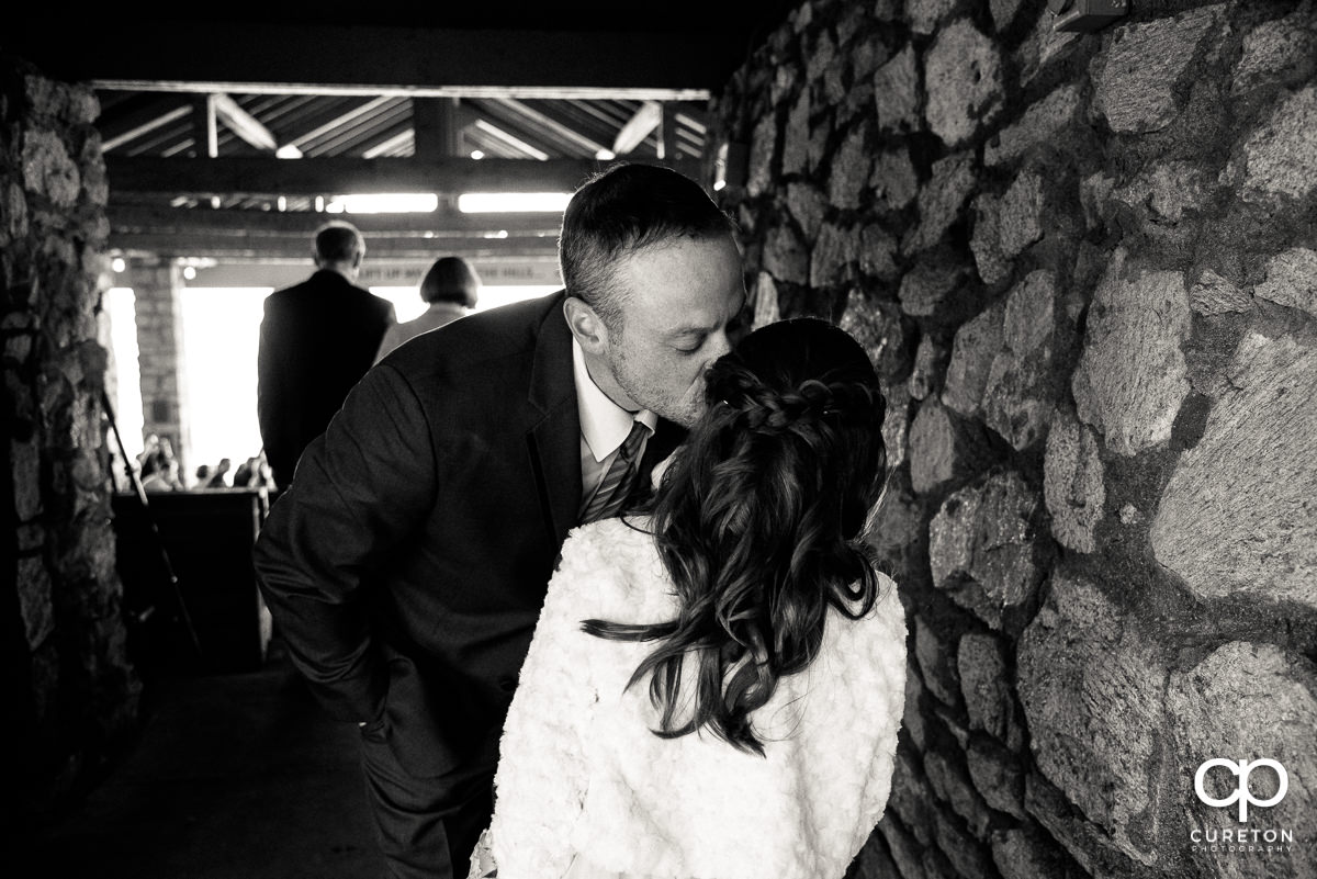 Groom kissing his daughter before the wedding ceremony.