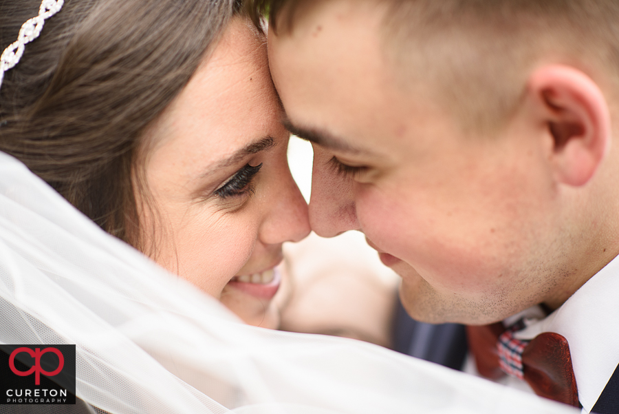 Closeup of bride and groom.