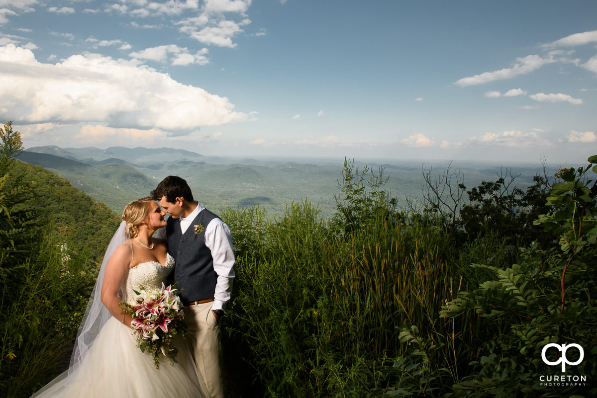 Bride and Groom standing face to face after their Pretty Place wedding.