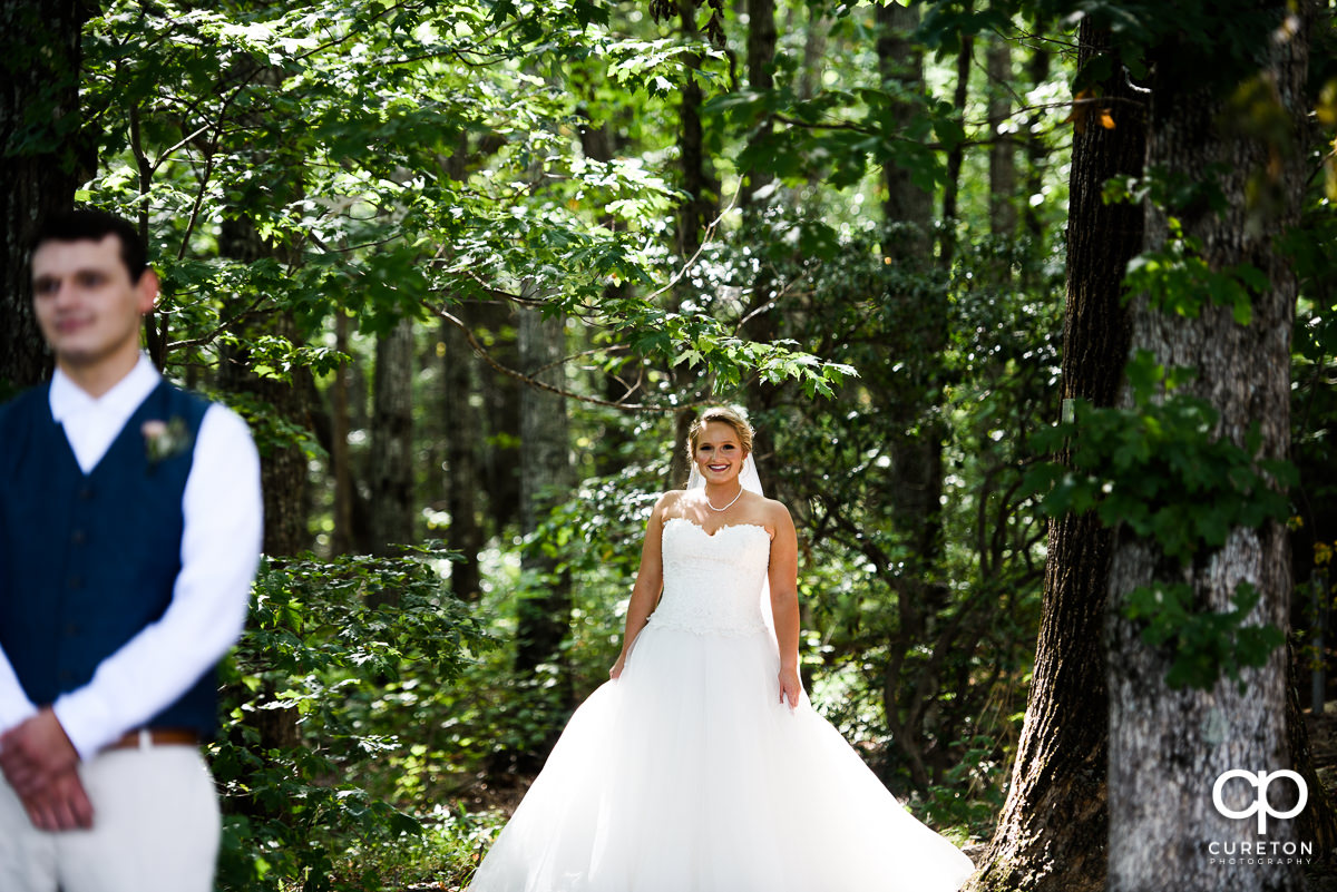 Bride smiling during the first look.