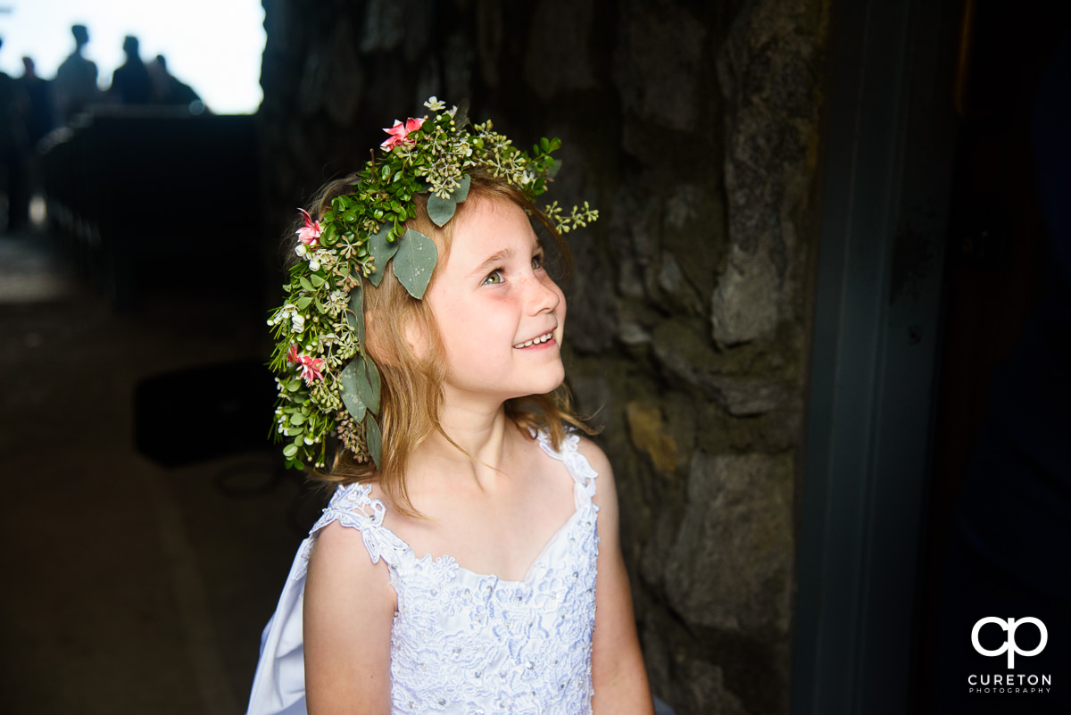 Flower girl smiling.