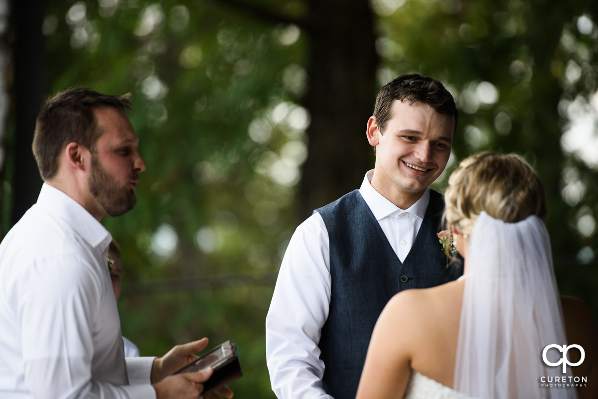 Groom looking at his bride.