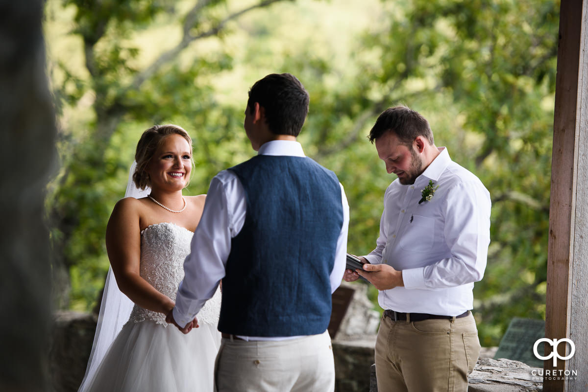 Bride laughing during the ceremony at Pretty Place.