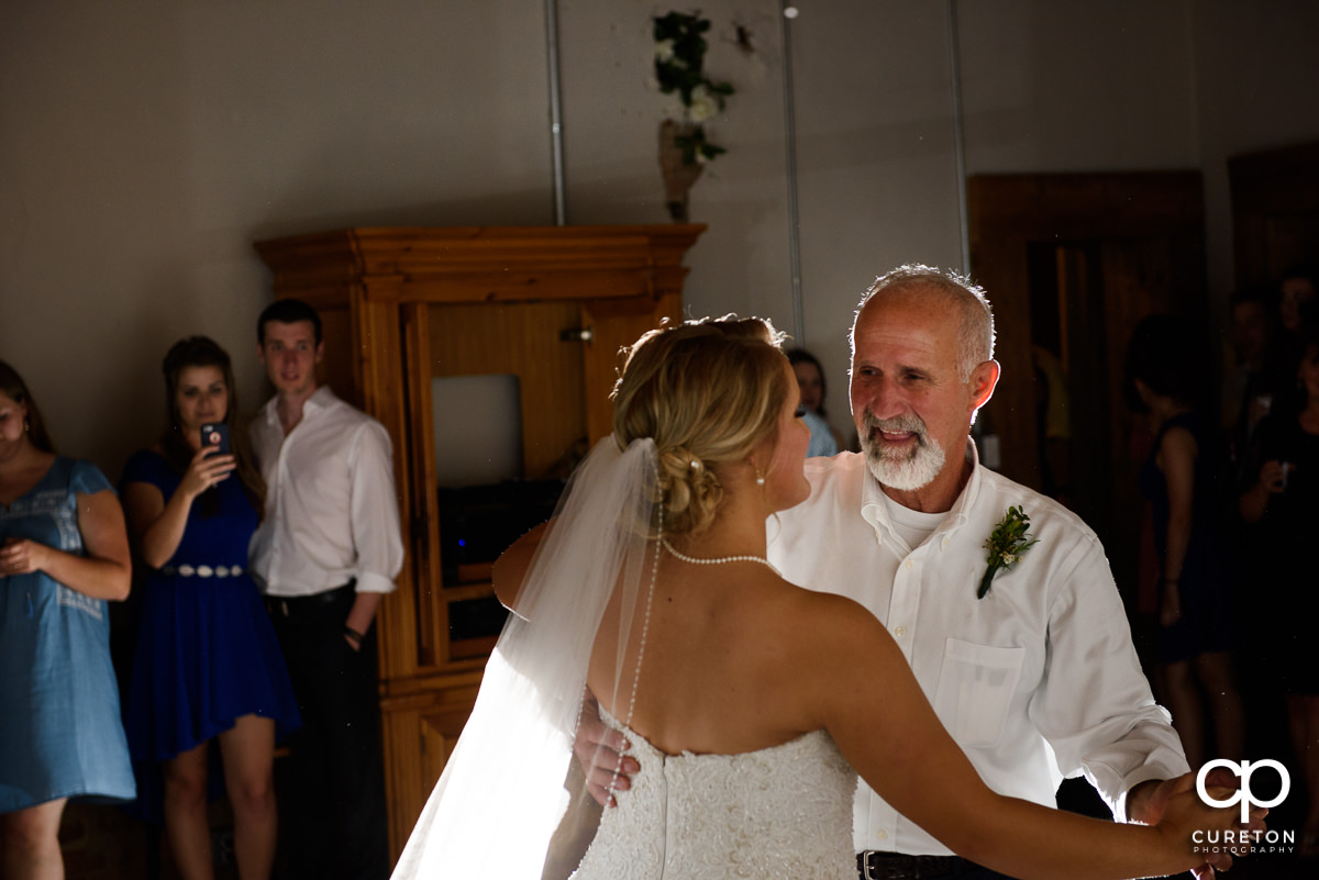 Bride and father dance at Artisan Traders.