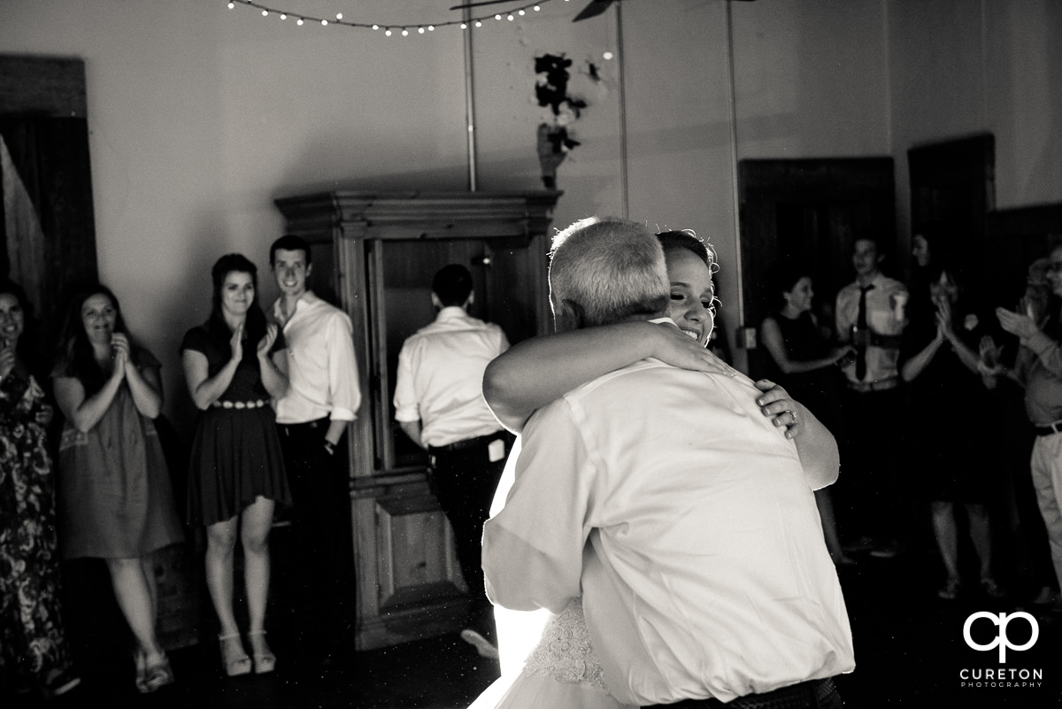 Bride and her father dancing.