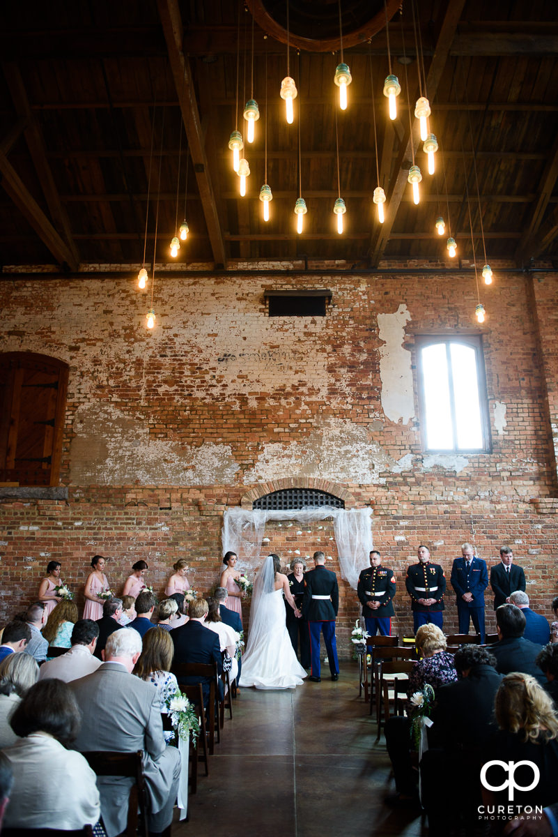 Old Cigar Warehouse wedding ceremony in the Main Hall.
