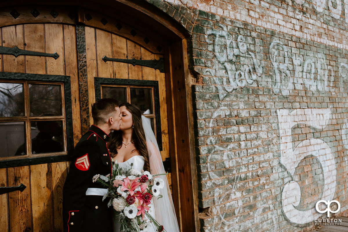 Bride and groom on the back deck.