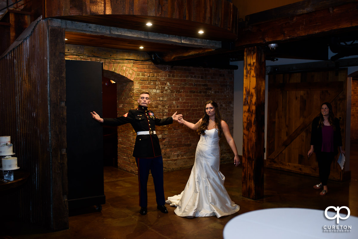 Bride and groom entering the reception.