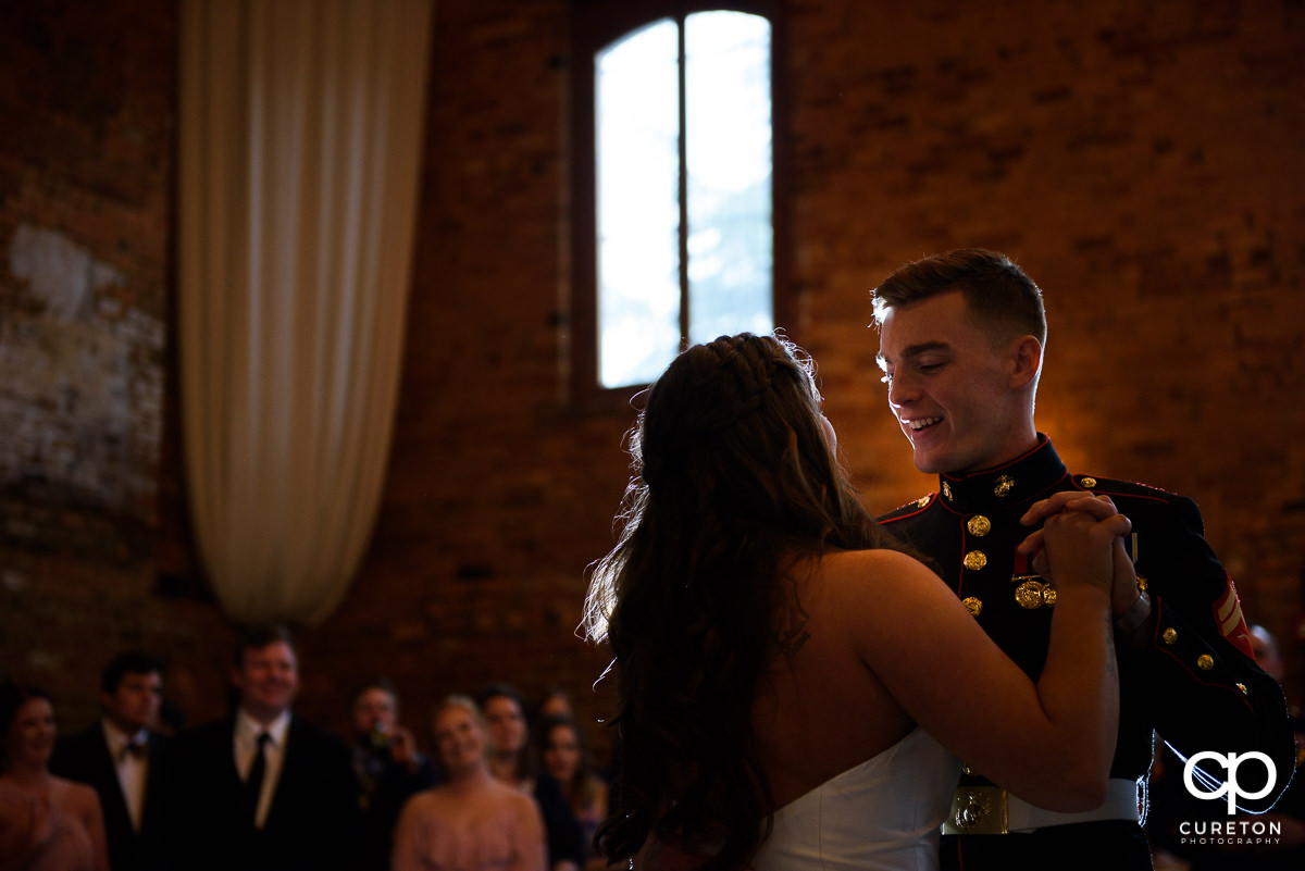 Bride and groom sharing a first dance at the wedding reception.