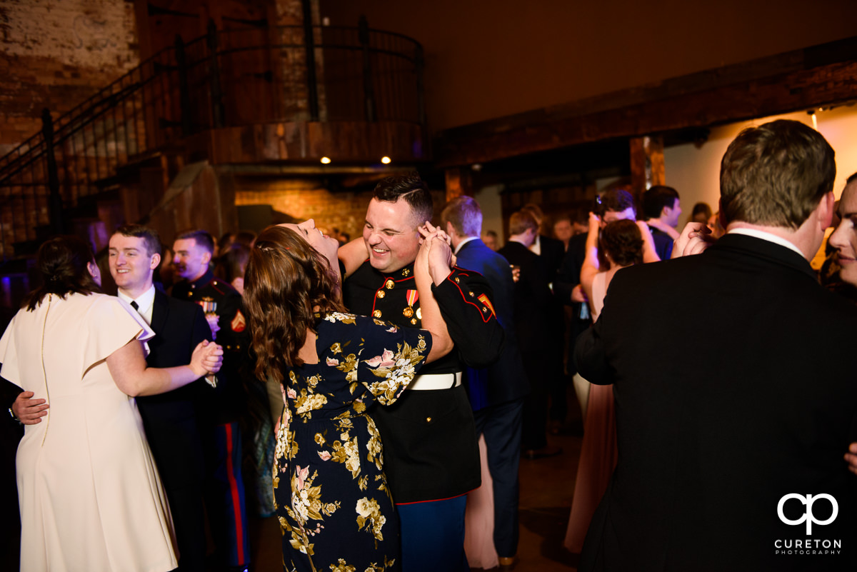 Wedding guests dancing as the Party Machine dj's the reception.