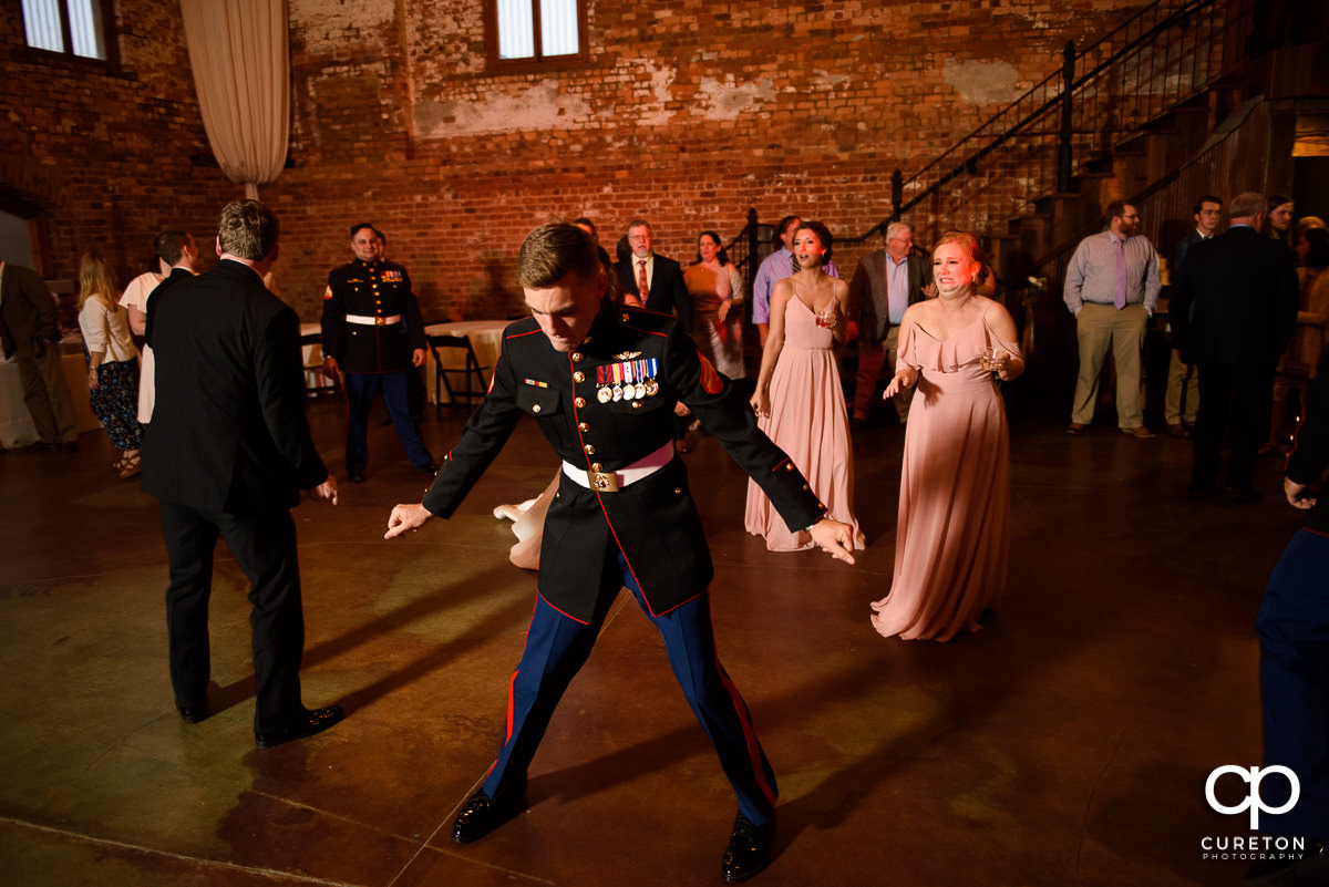 Wedding guests dancing as the Party Machine dj's the reception.