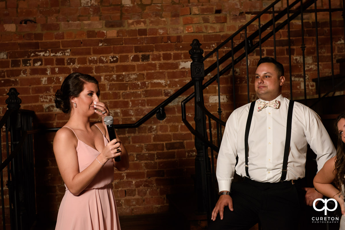 Bridesmaid giving a speech.