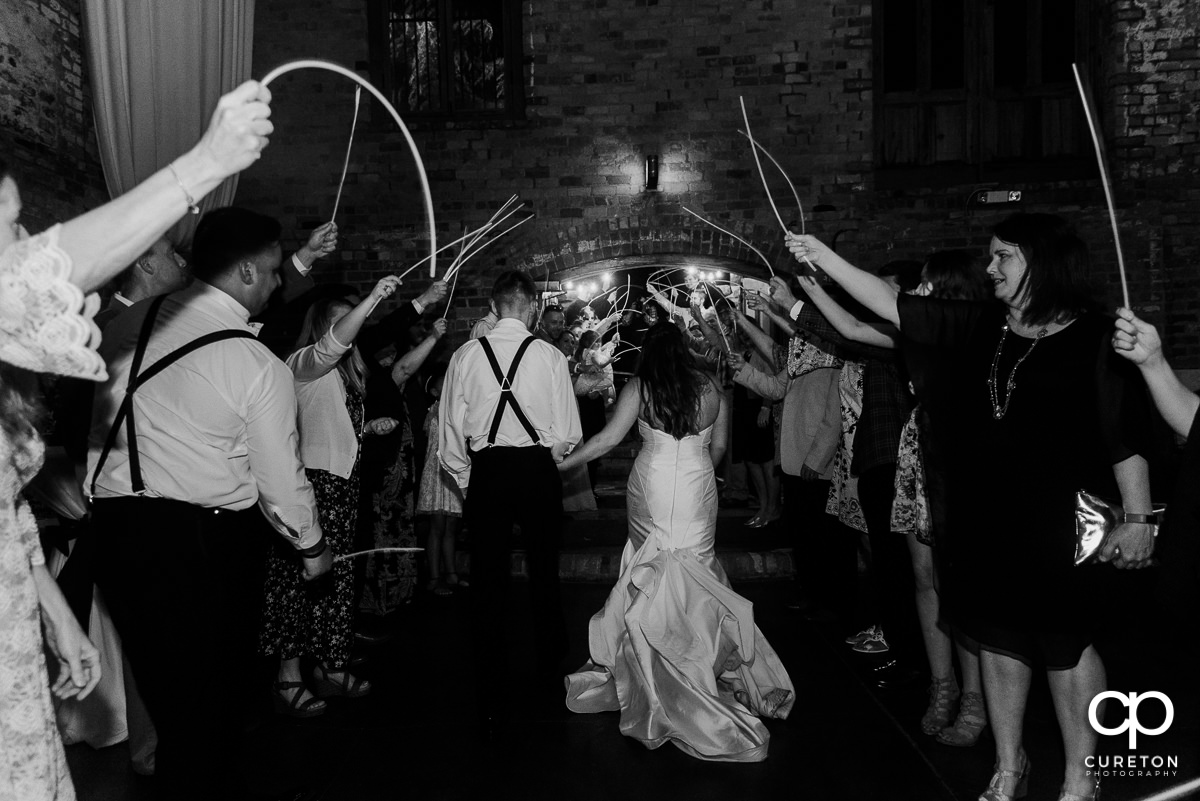 Bride and groom preparing to make a grand exit.