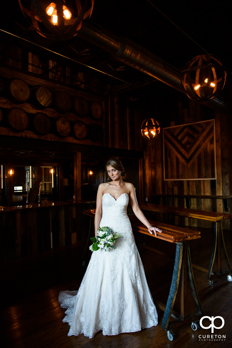 Bride standing in the bar at Revel.