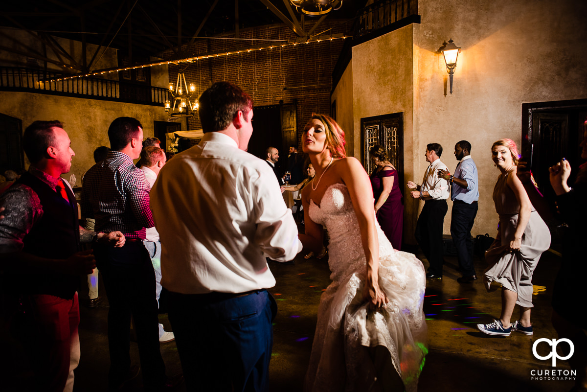Bride dancing during the wedding reception.