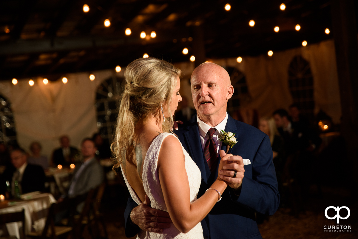 Bride dancing with her father.