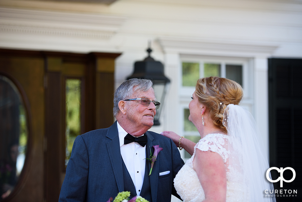 Bride and father first look.